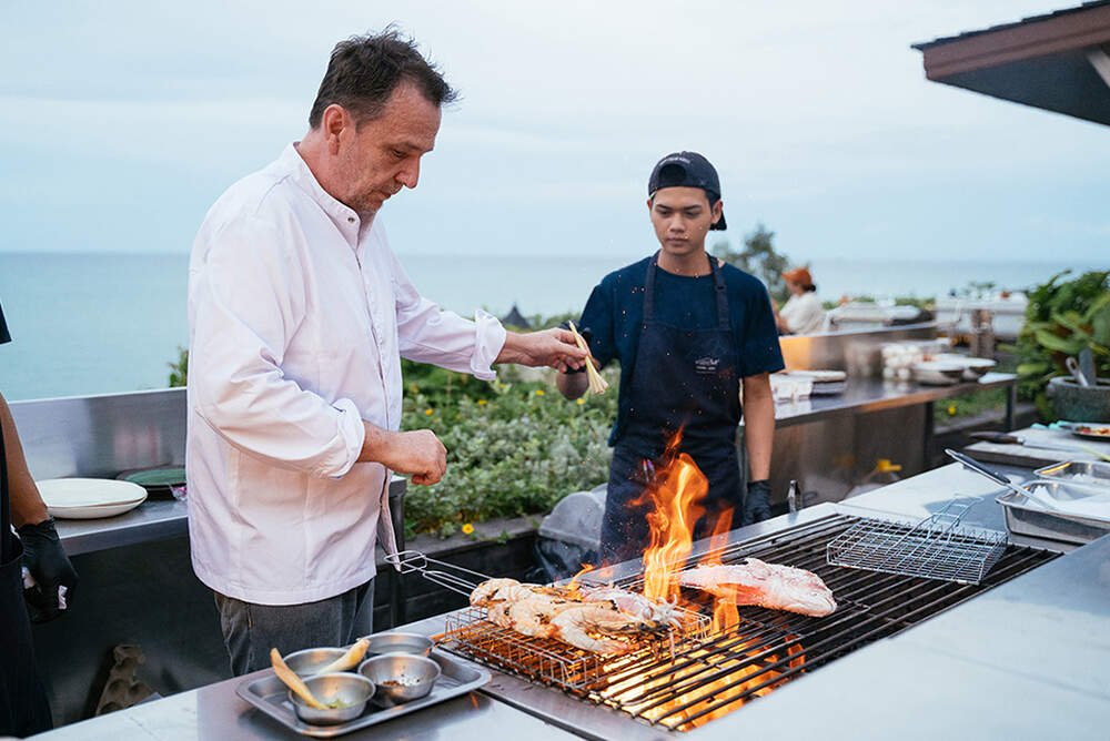 Chef David Thompson demonstrating his cooking skills